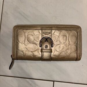 Coach Soho Metallic Gold
Leather Zip Around Continental Wallet